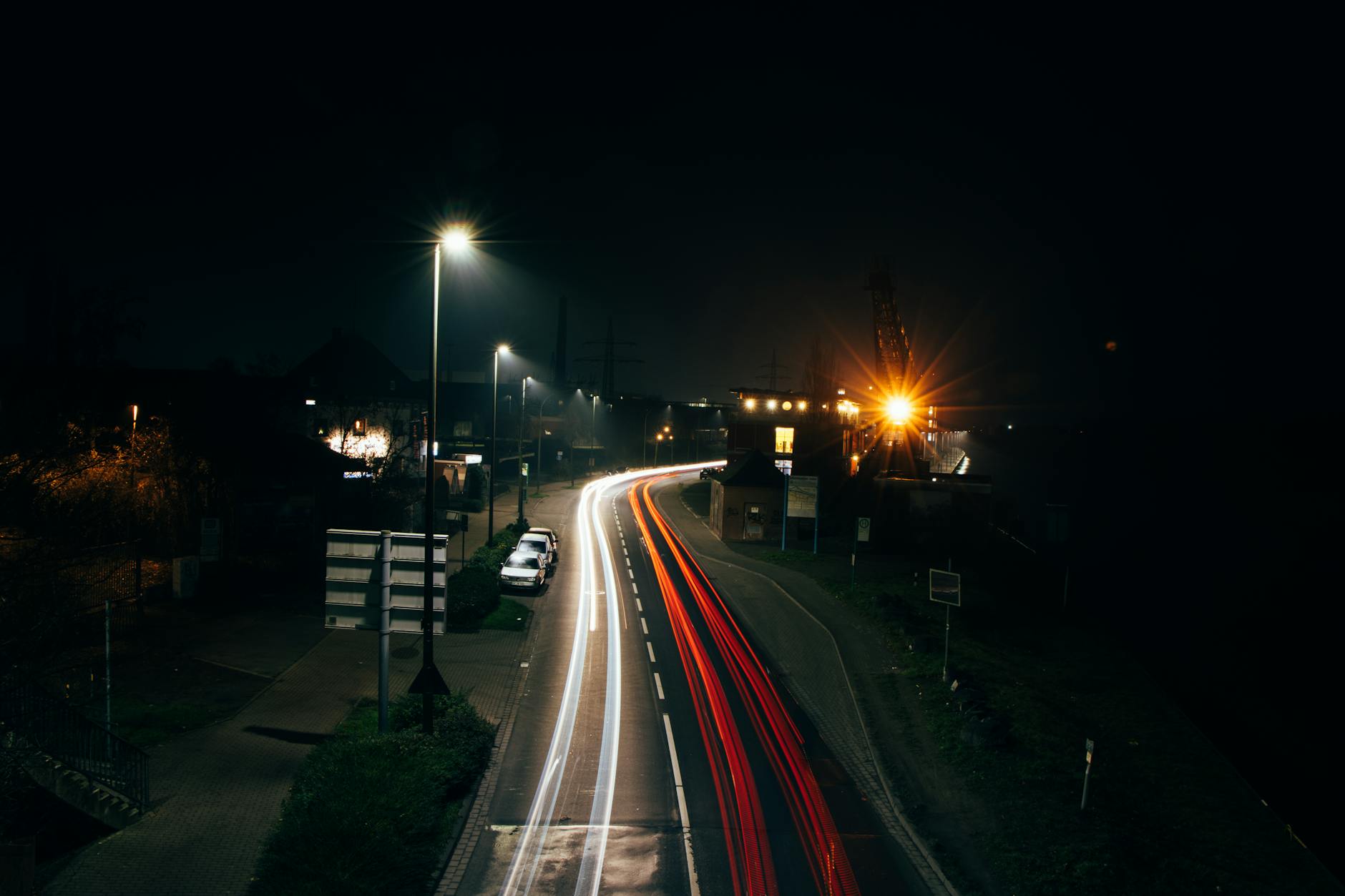 Well-lit Sydney Road Brunswick at night with pedestrians