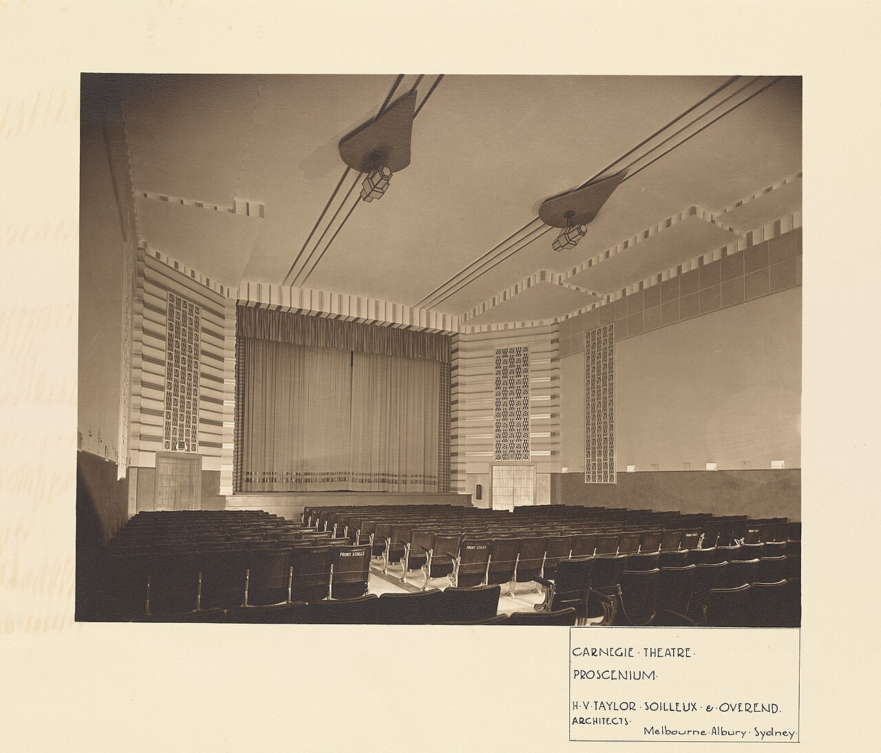 A 1920 sepia photograph of the proscenium and seating inside the Carnegie Theatre, since demolished
