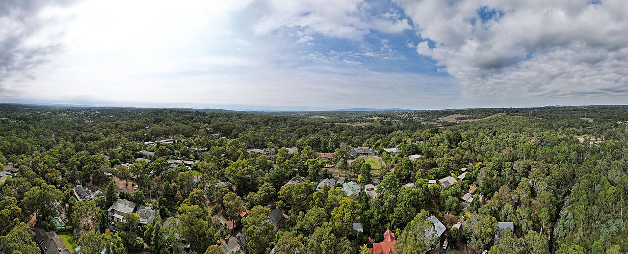 Aerial view over the treed suburb of Eltham