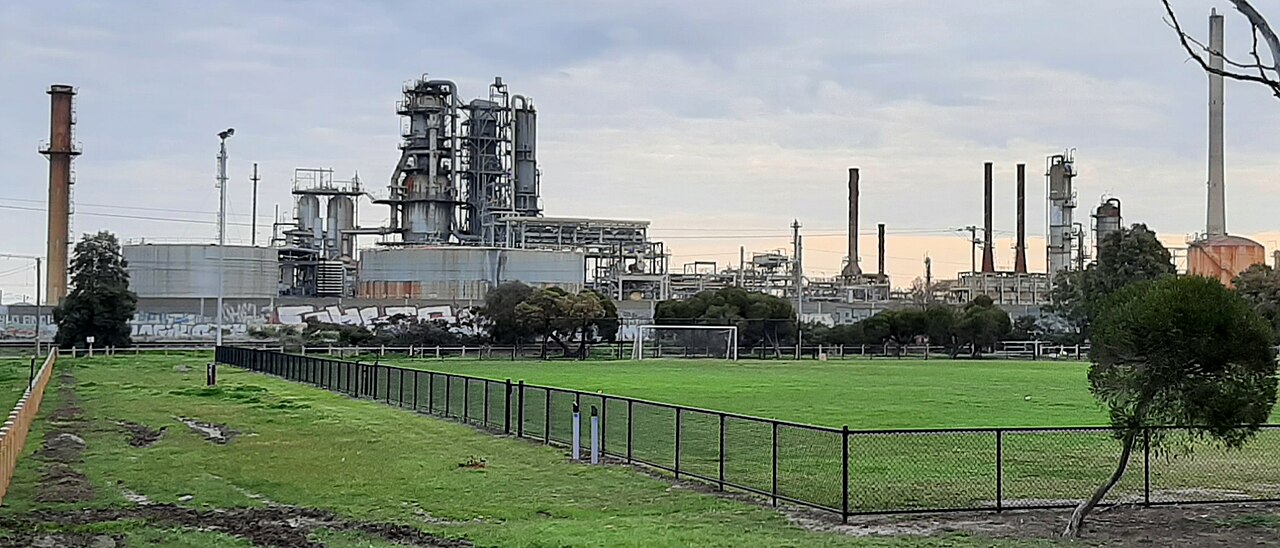 Altona oil refinery behind a sports oval