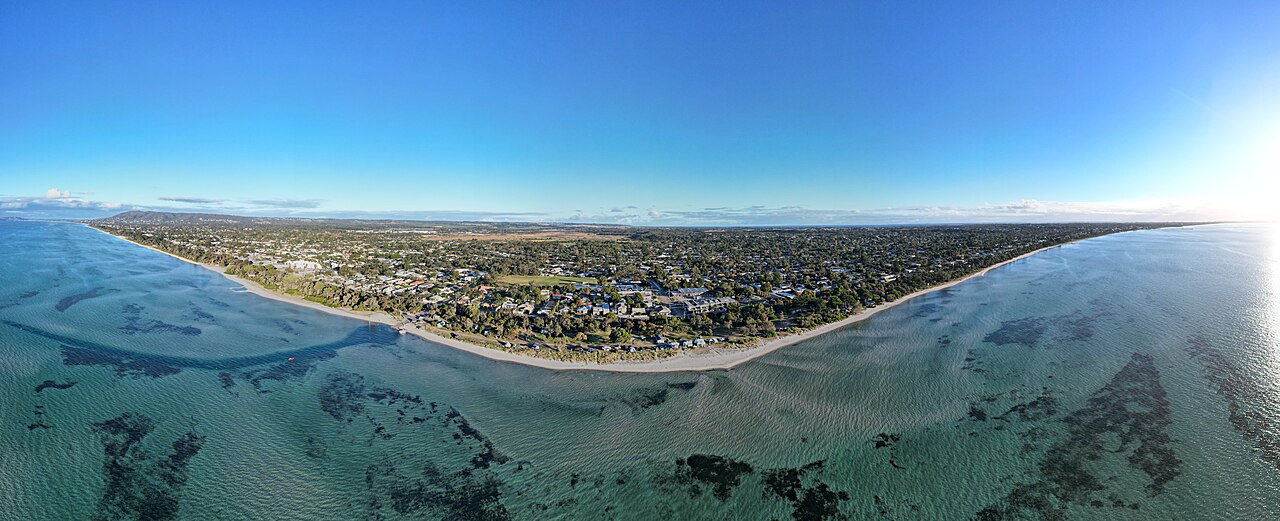 Aerial panorama of Capel Sound beach and suburbs