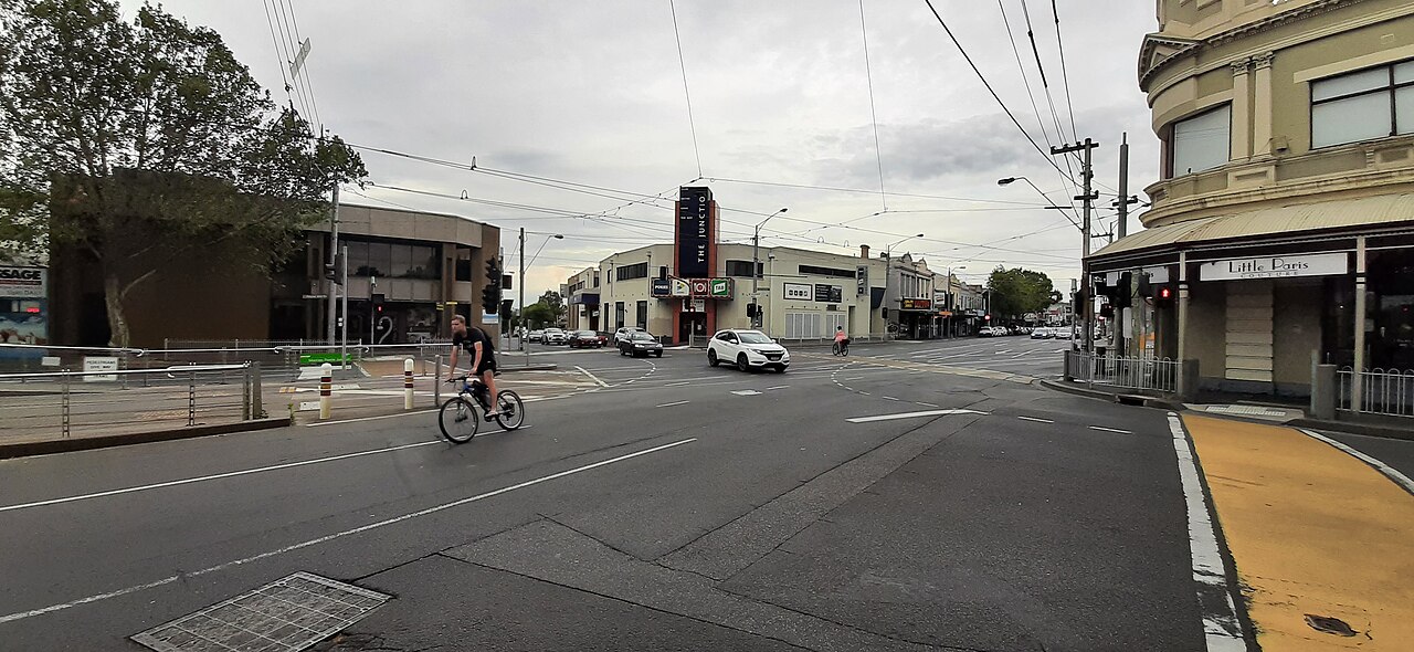 Street corner on Mount Alexander Road with low-rise shops