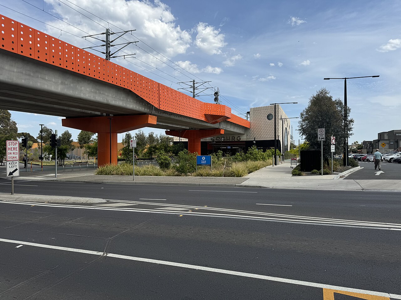 Landscaping beneath the elevated rail at Coburg railway station