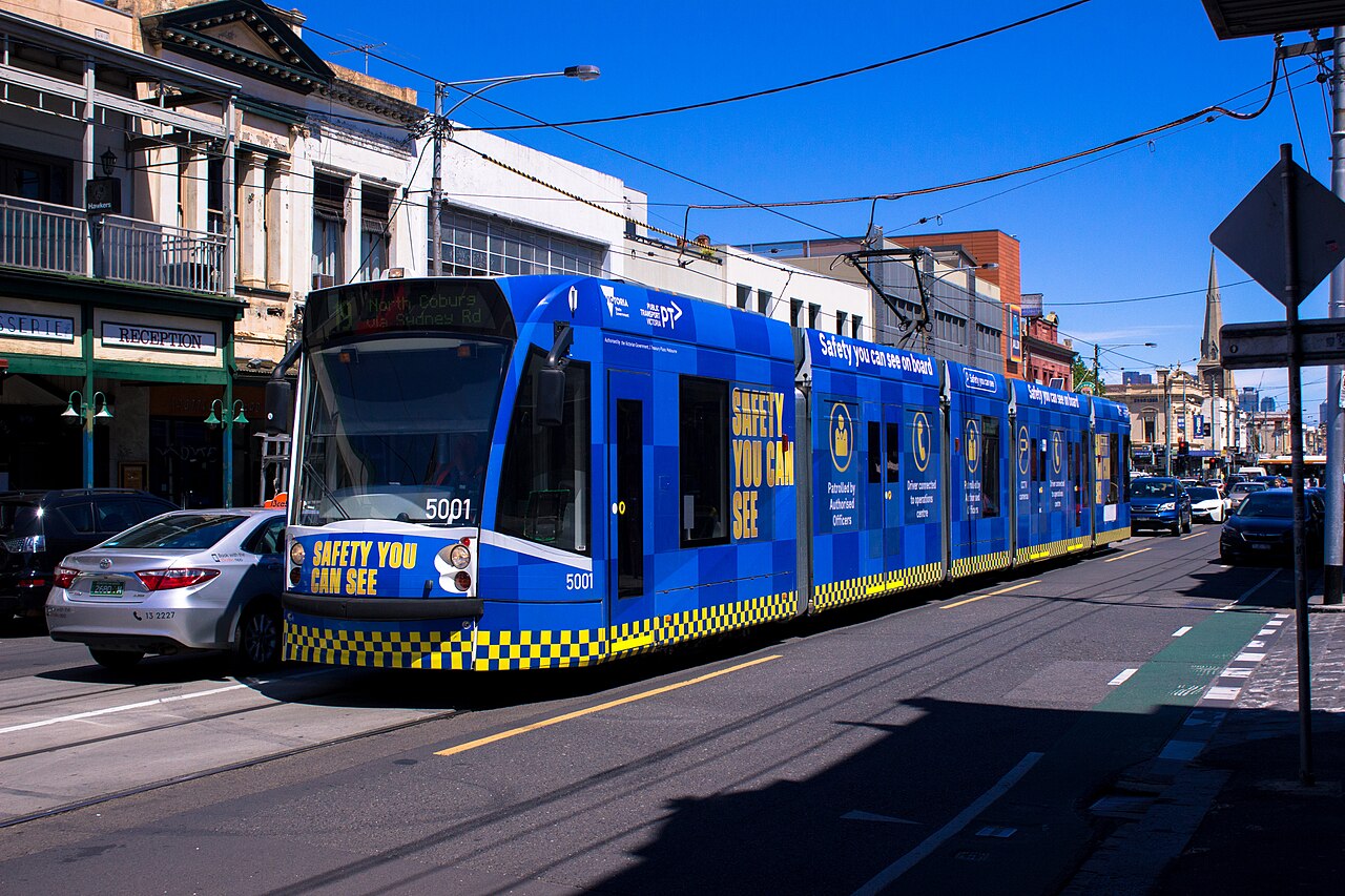 Blue D1-class tram on a Brunswick street