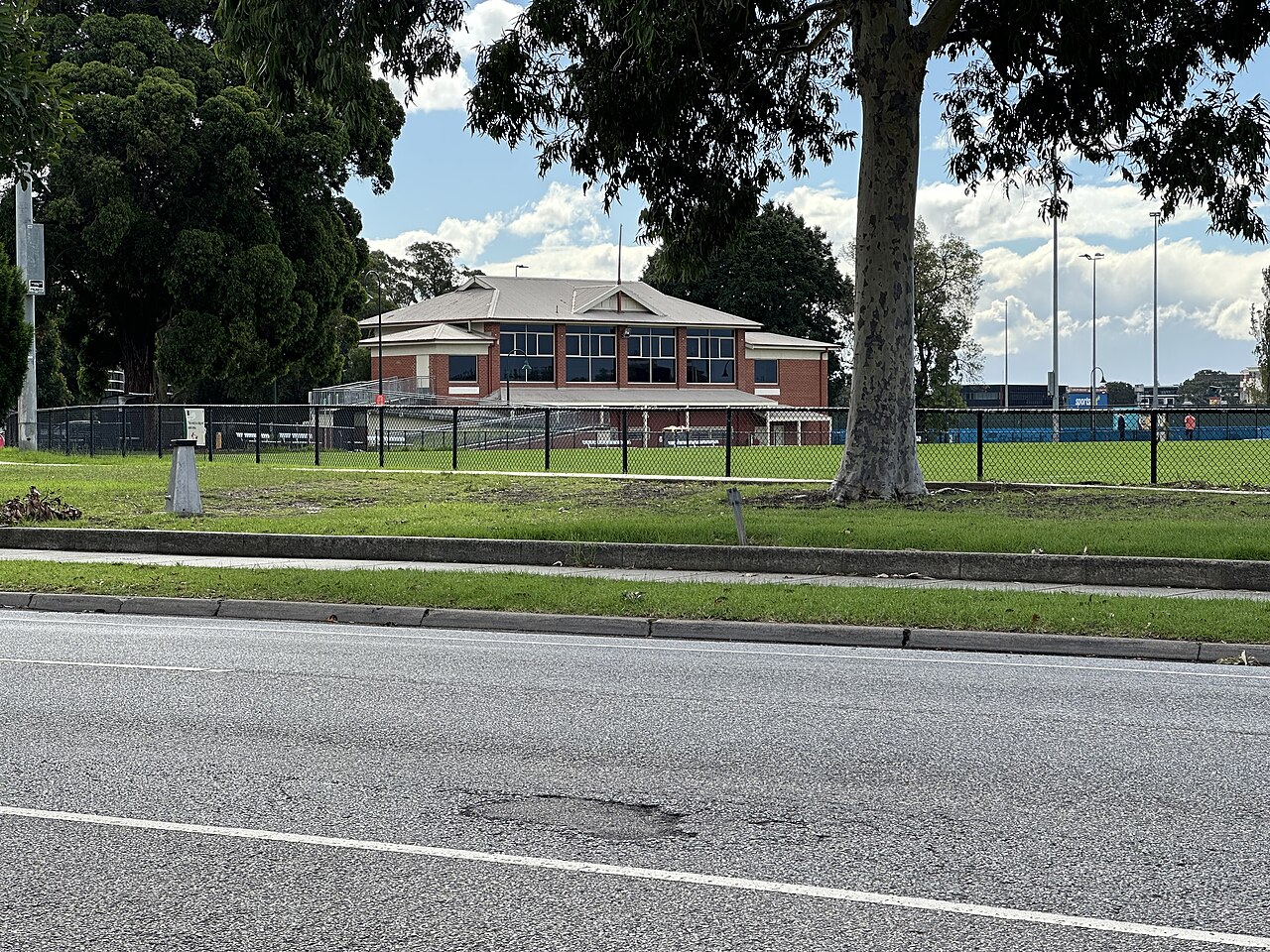Lawn, trees and pavilion at Glen Huntly Park