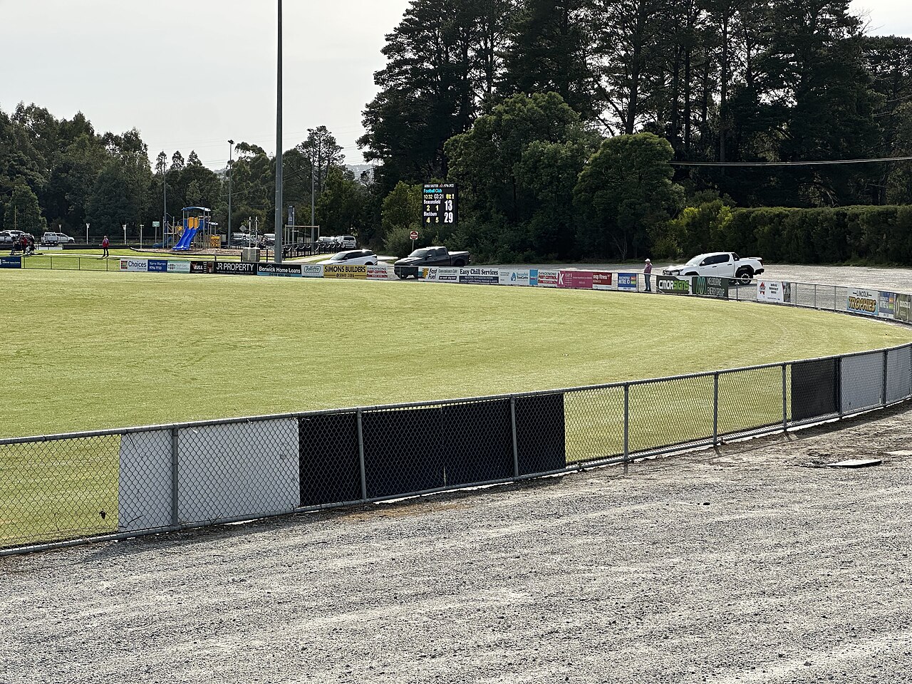 Holm Park Recreation Reserve oval with pine trees