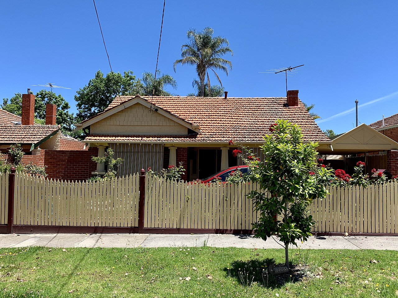 Brick house with a picket fence in Bentleigh