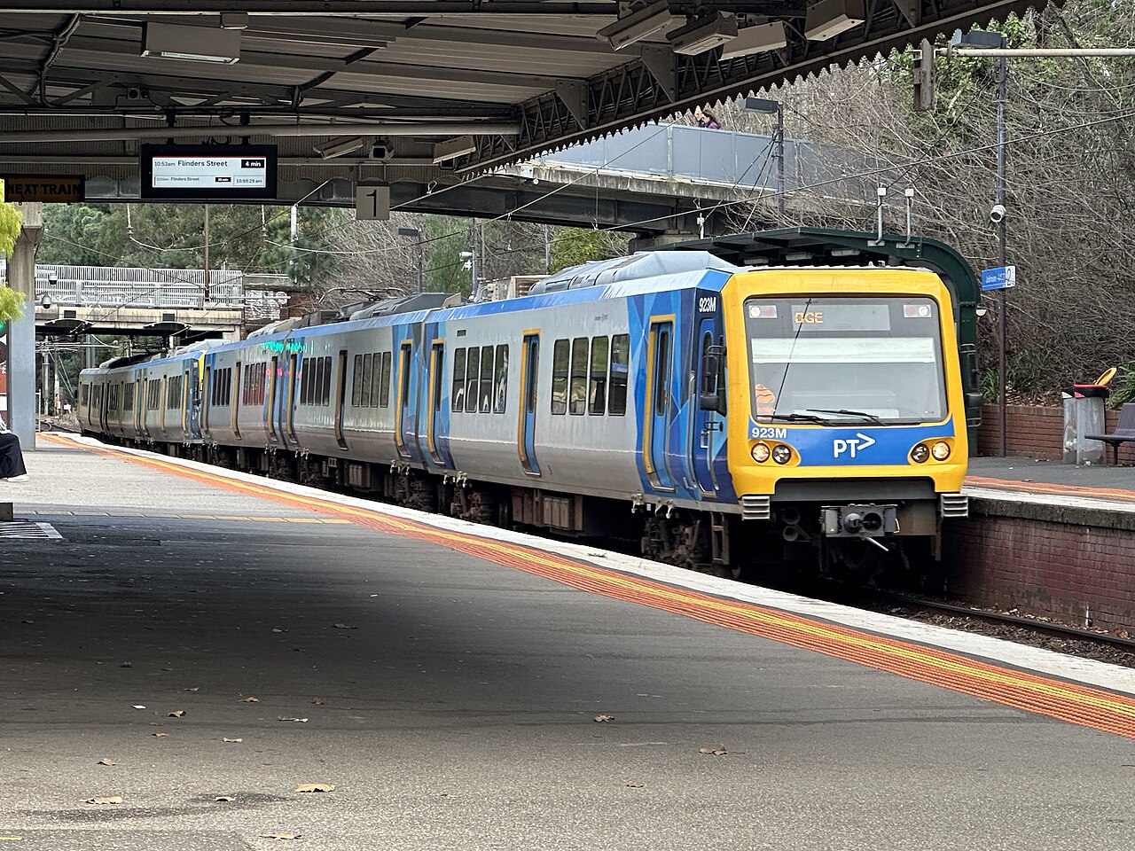 Hurstbridge line train arriving at Jolimont station