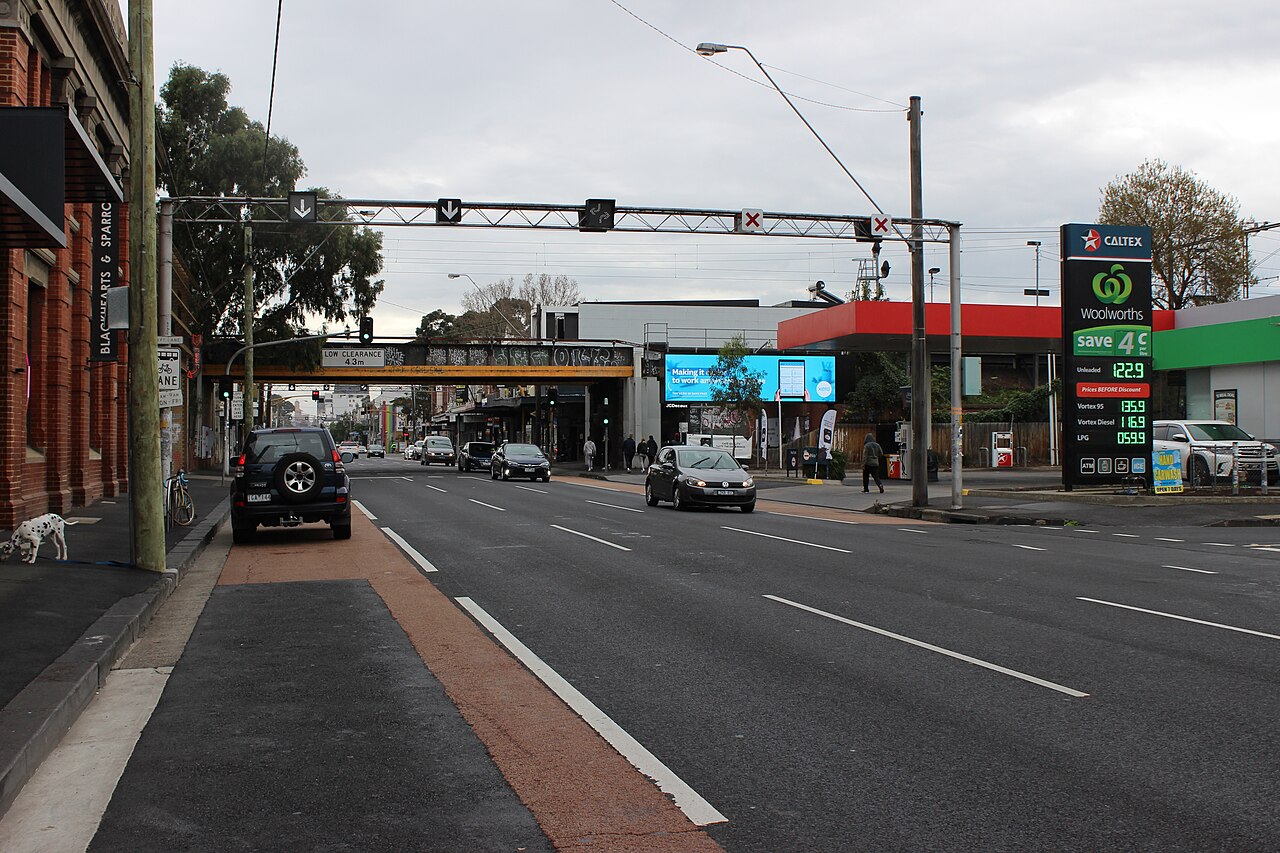 Johnston Street, Abbotsford, with traffic lights and shops