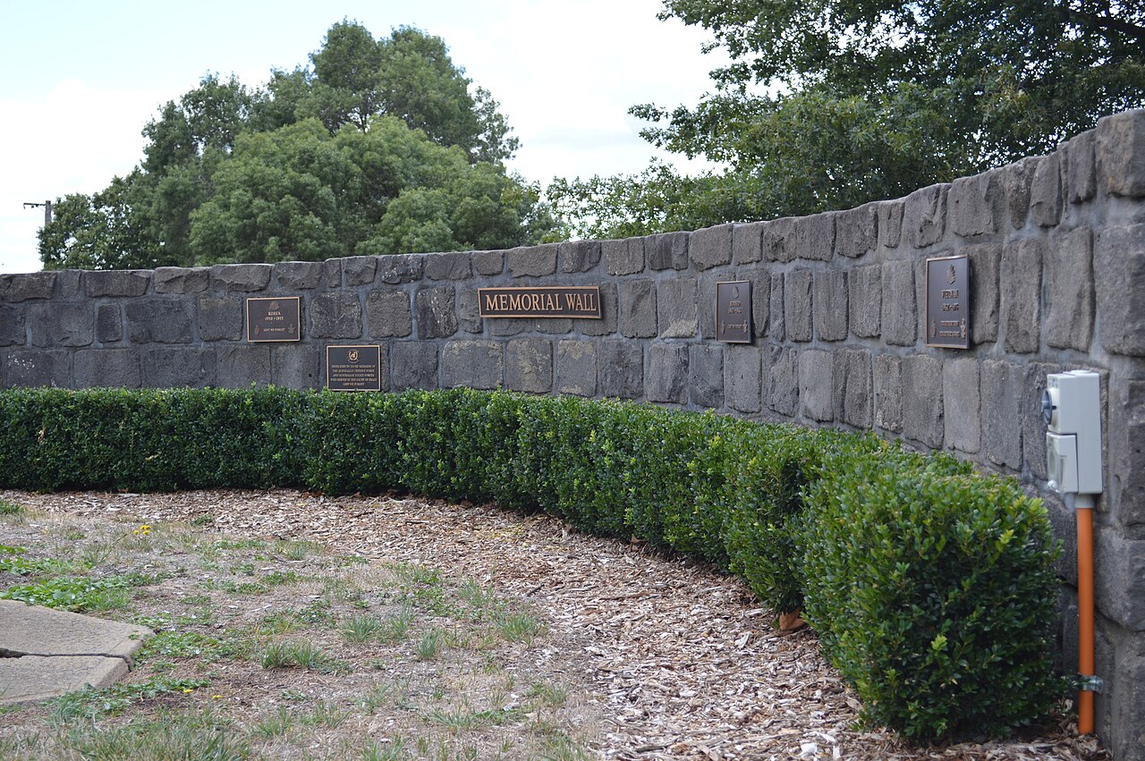 Kilmore War Memorial wall with hedging