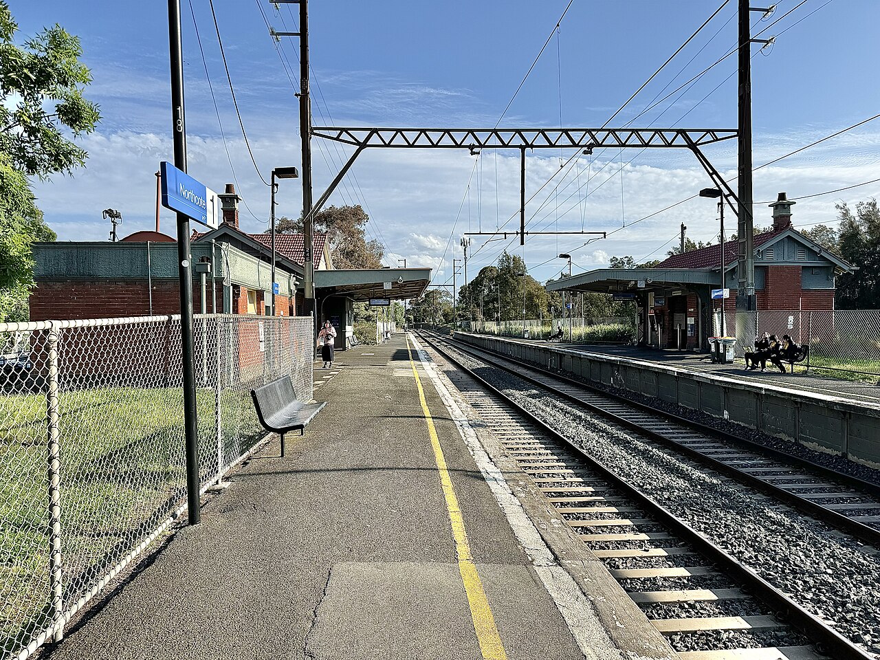 Platform 1 at Northcote railway station with heritage buildings
