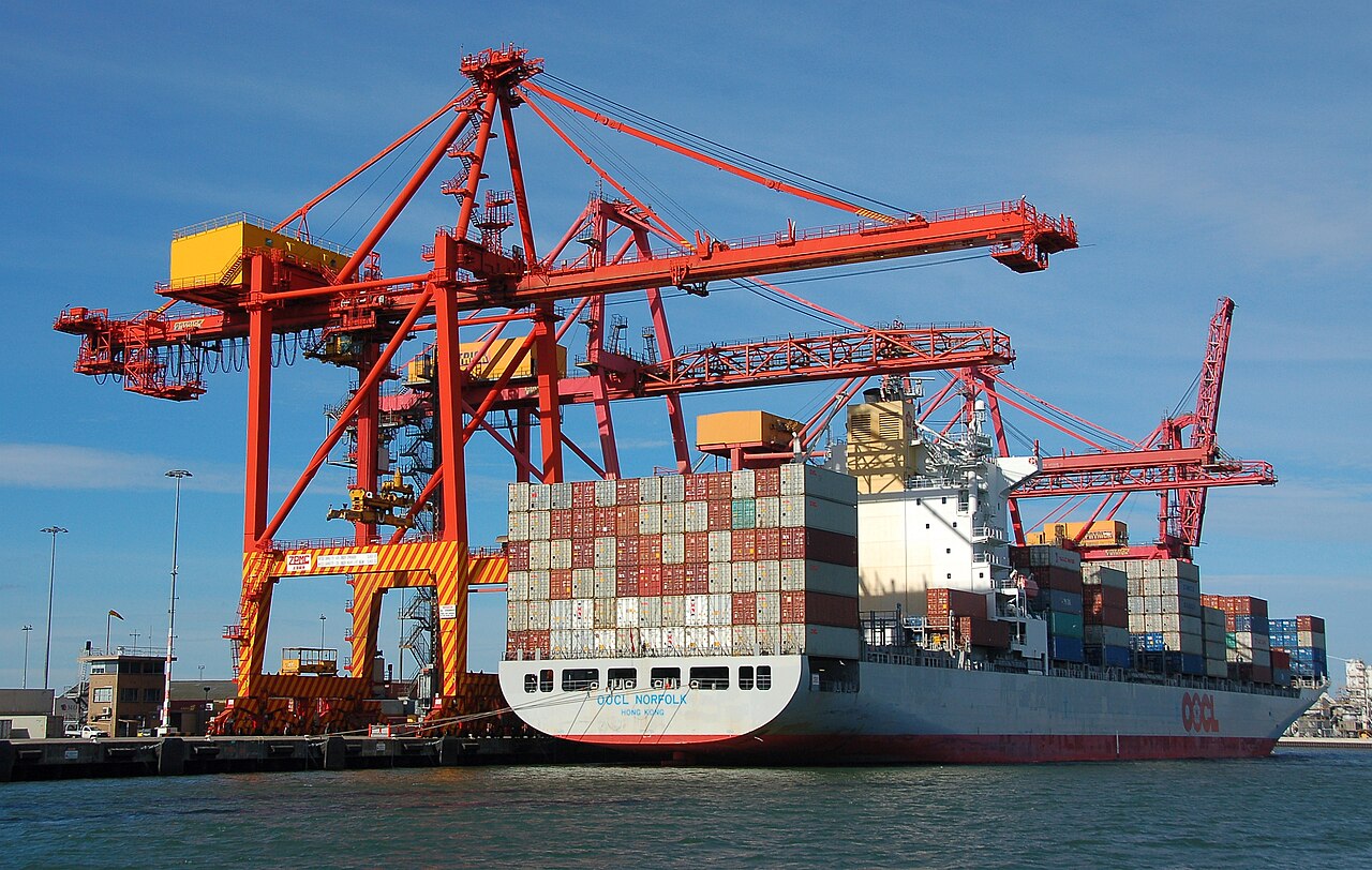 Container ship at cranes in the Port of Melbourne
