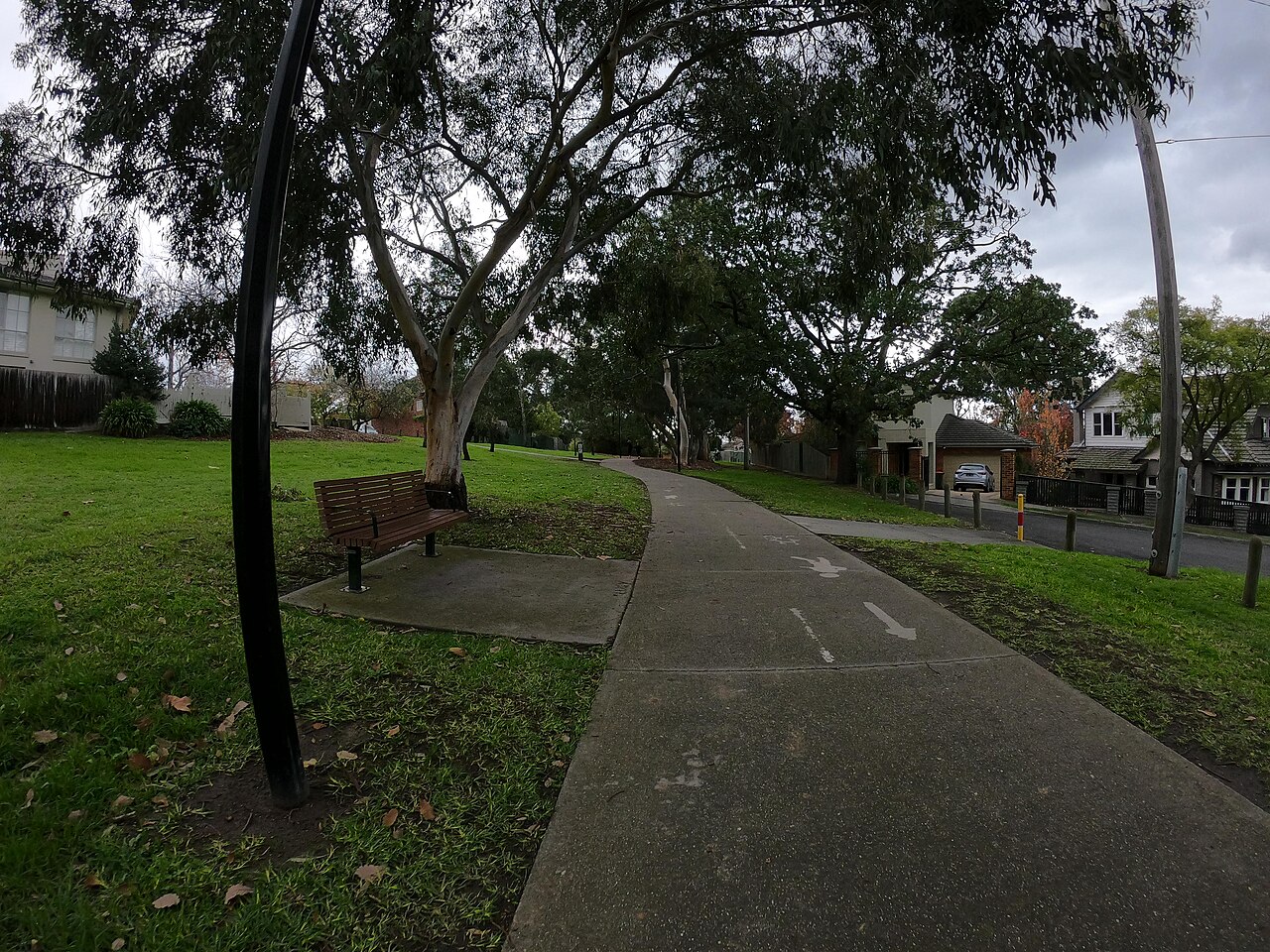 Outer Circle Trail with a bench near Second Avenue