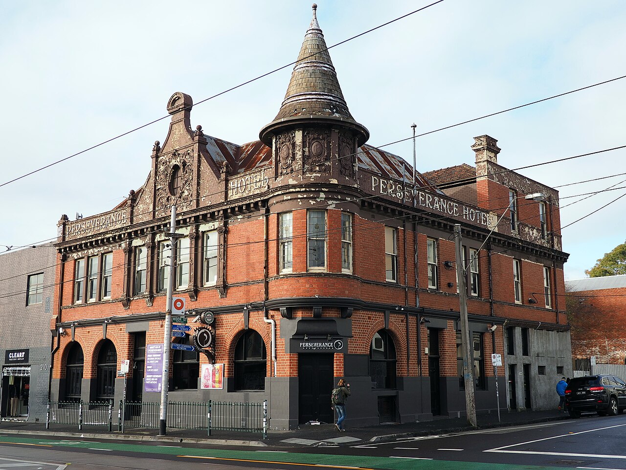 Perseverance hotel, red brick corner building