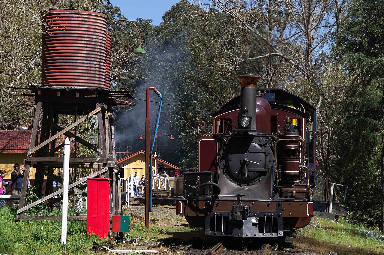 Puffing Billy steam train beside the water tower at Lakeside