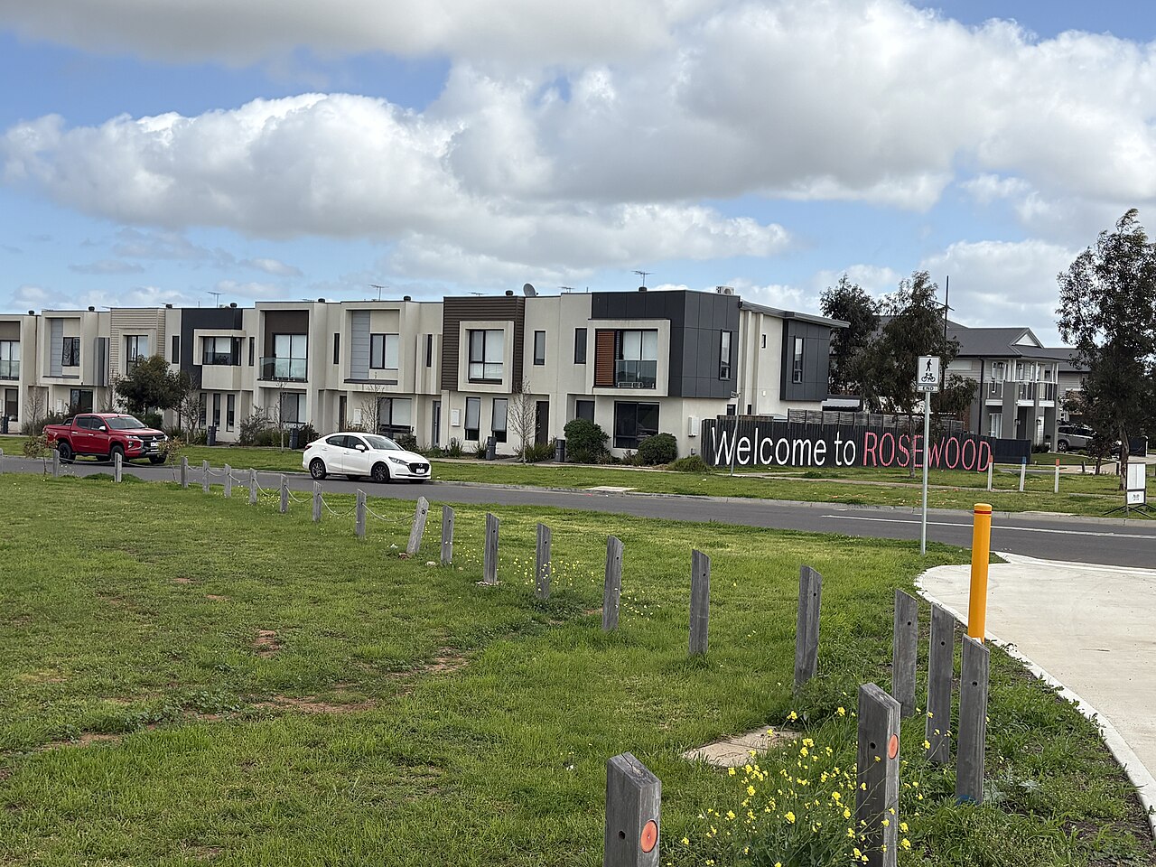 New townhouses and grass verge in Rosewood, Deanside
