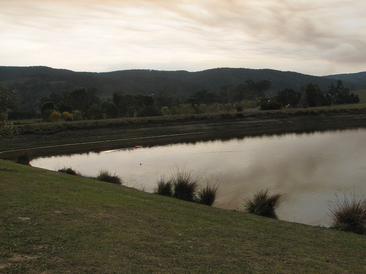 Dam below hills at Roundstone in the Yarra Valley