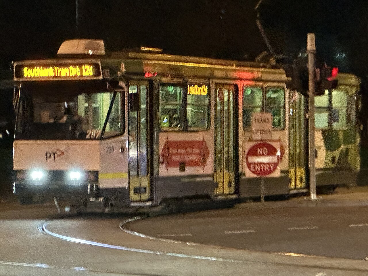 Route 12 tram at night in Albert Park
