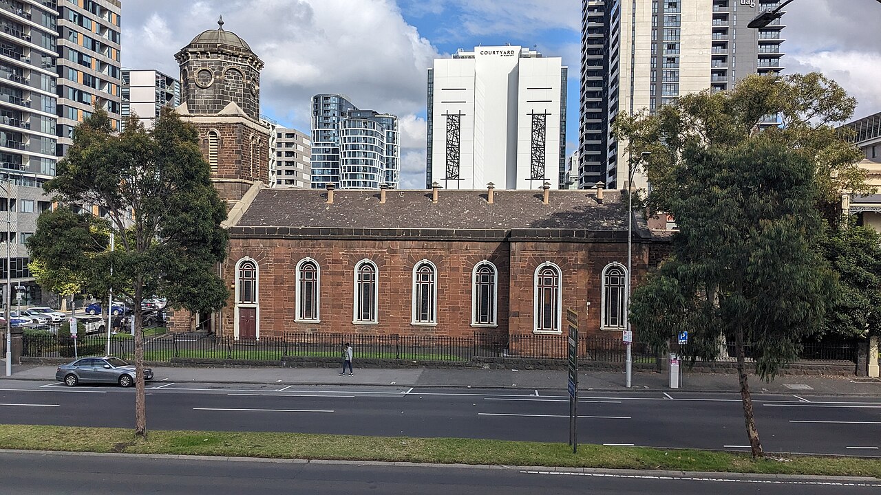 Side view of St James Old Cathedral with towers behind