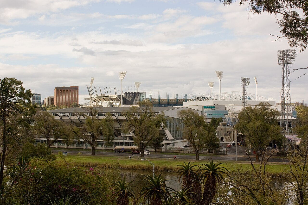 Distant view of the MCG and stadiums over parkland