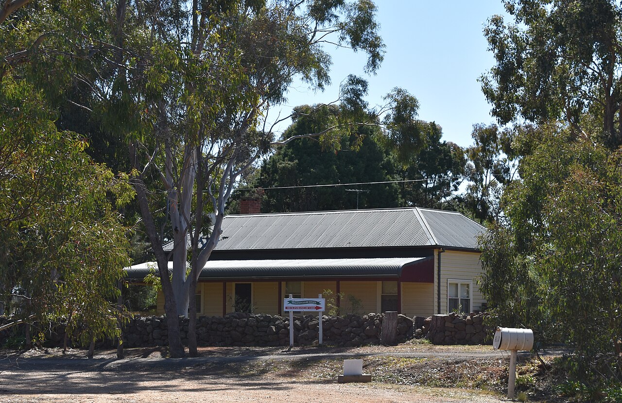 Strathtulloh Estate house among gum trees