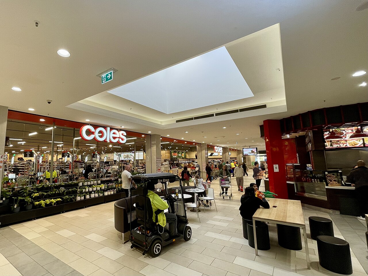 Inside Stud Park Shopping Centre, with a Coles supermarket on the mall
