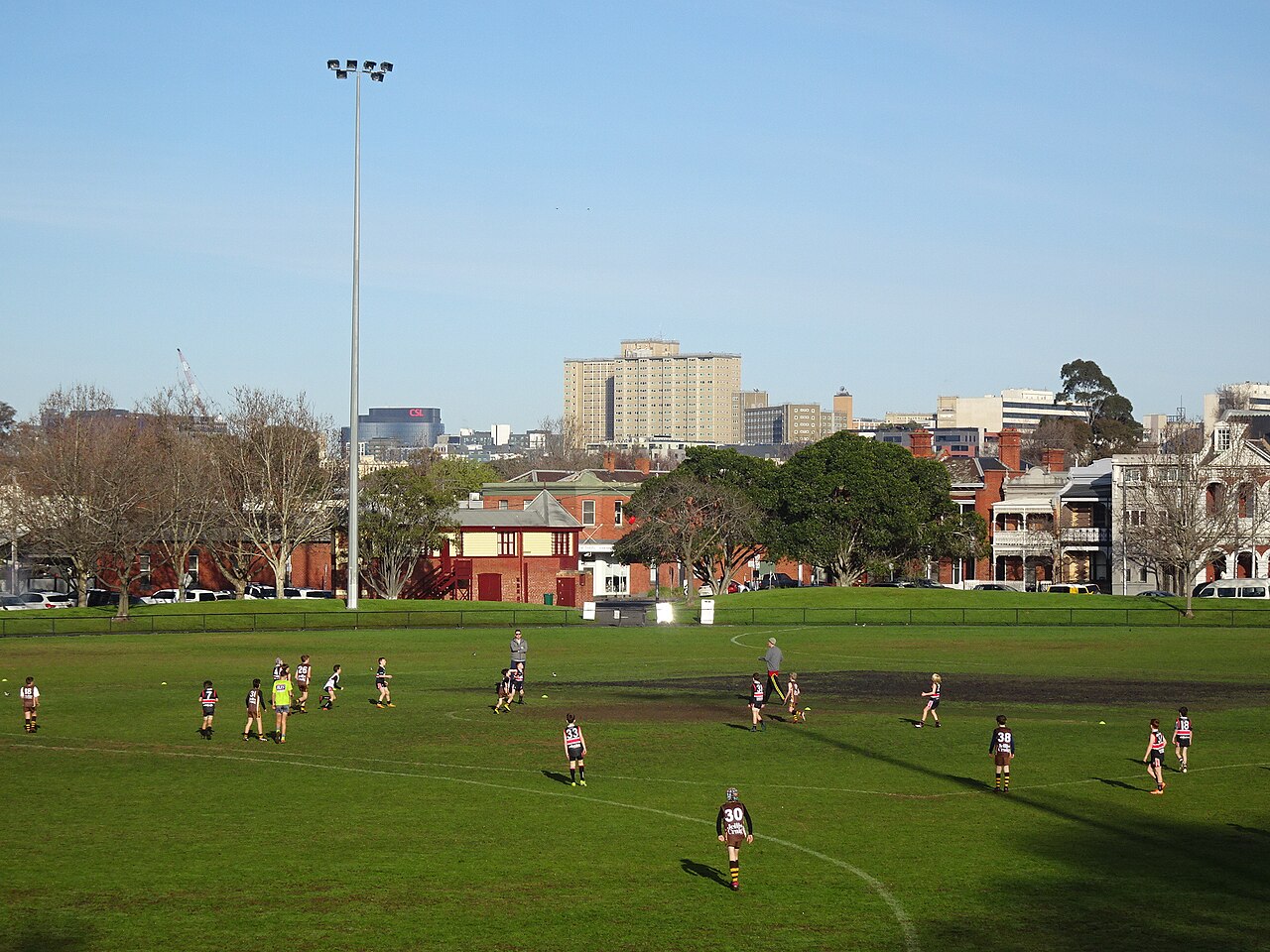 Sunday morning football on a suburban oval