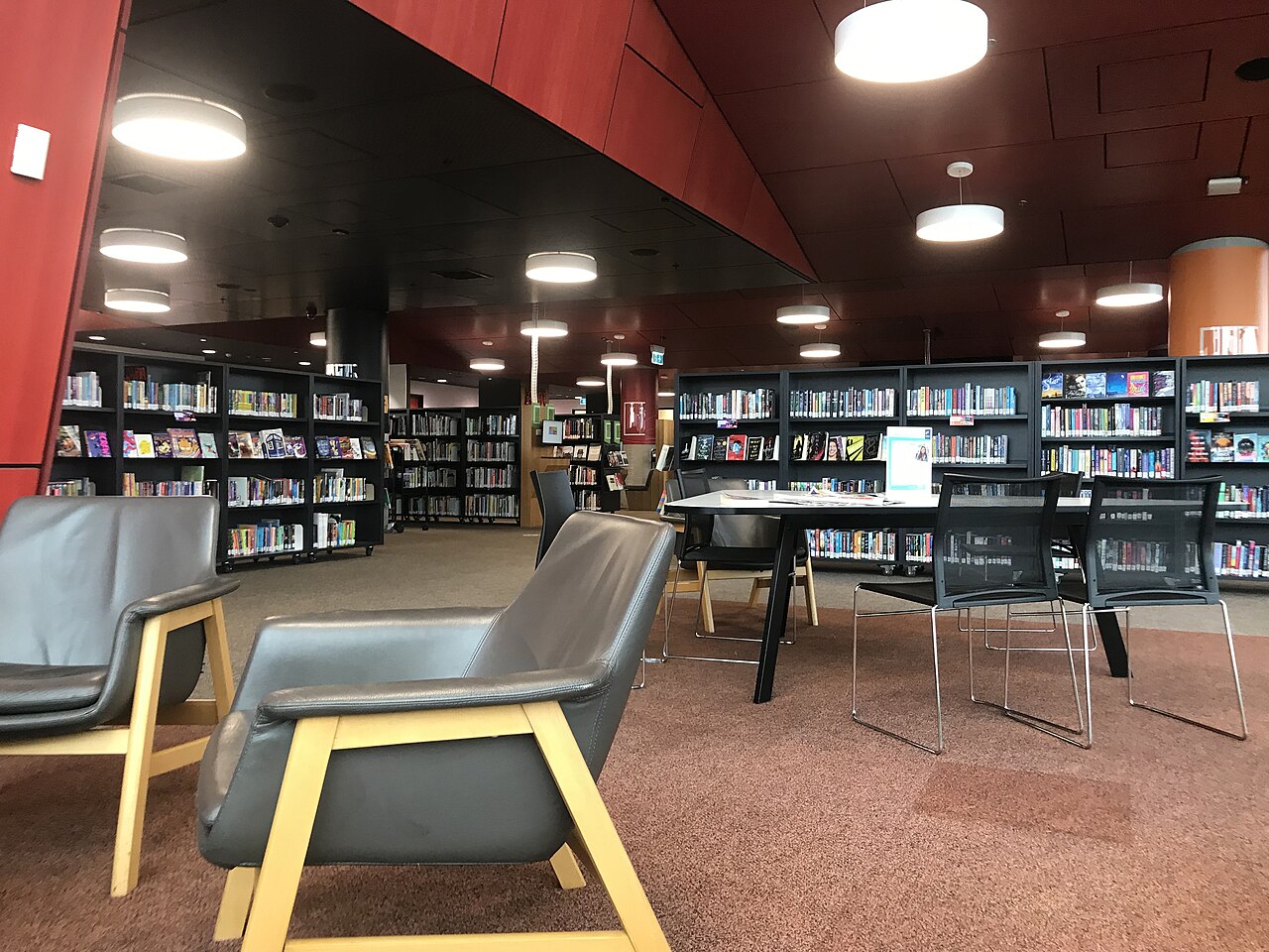 Reading area and shelves inside Sunshine Library