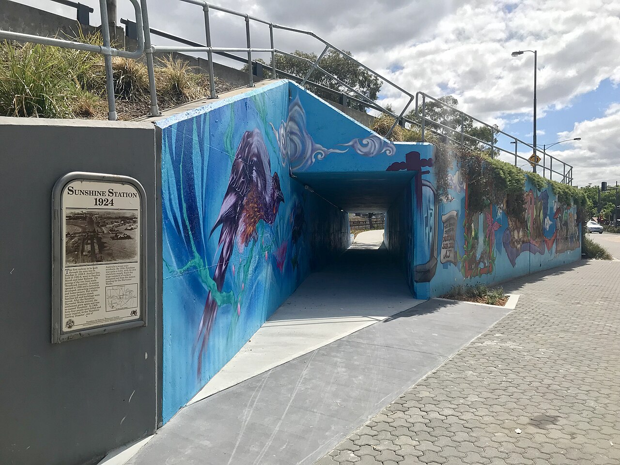 Mural-covered bike underpass at Sunshine station