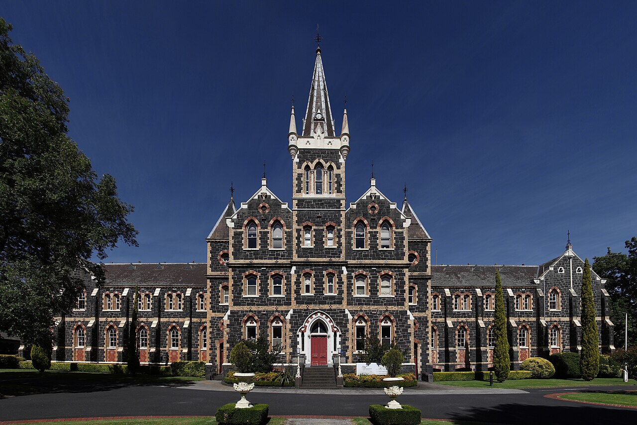 Gothic bluestone facade of the Victoria College for the Deaf
