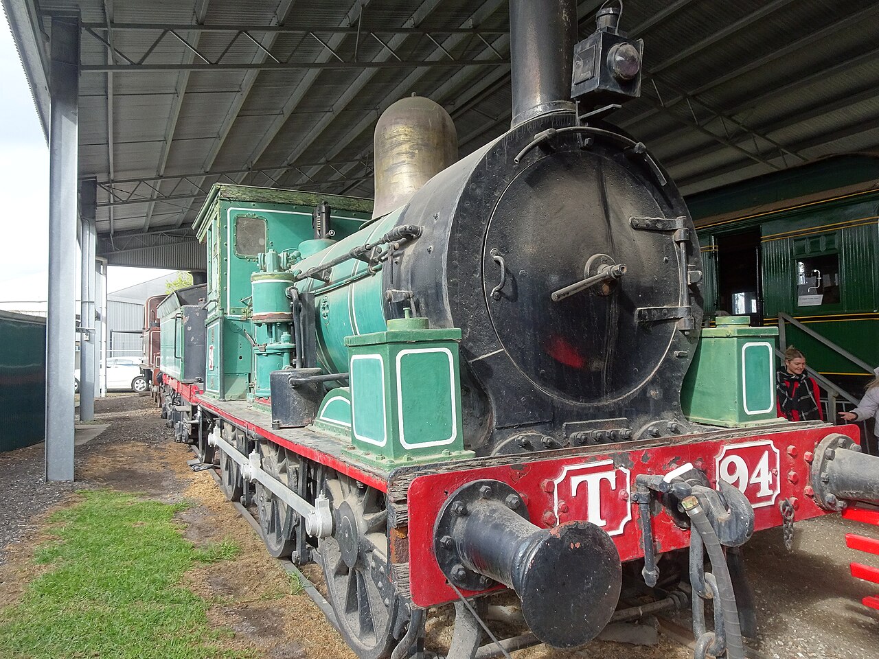 Green Victorian Railways T class locomotive under a museum shed