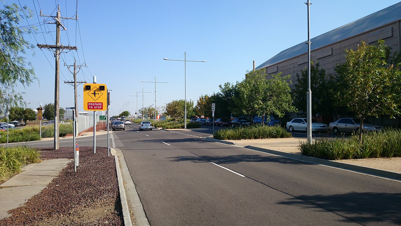 Wirraway Road at Essendon Airport, lined with young trees