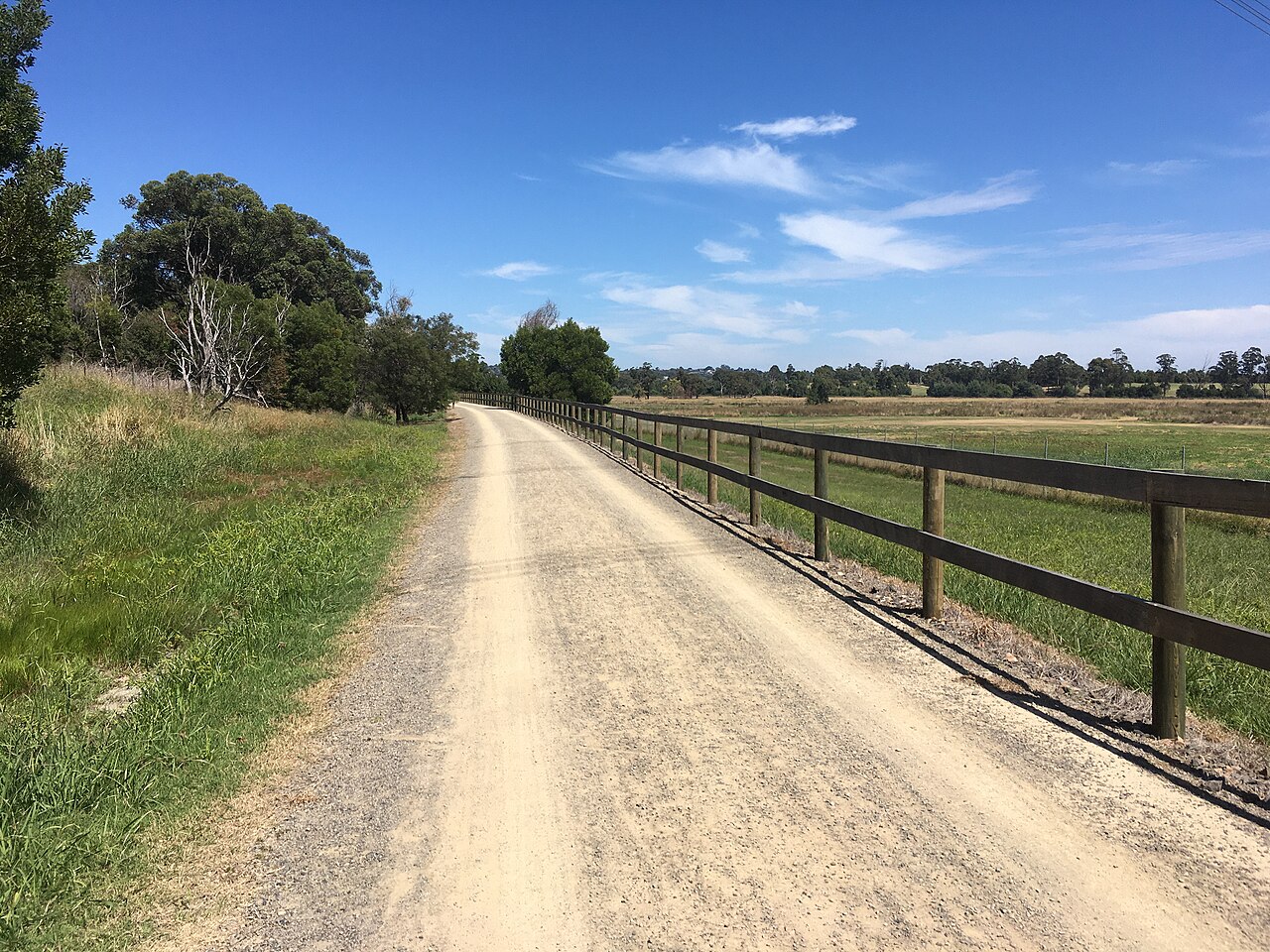 Gravel Yarra Valley Trail at Lilydale beside a paddock fence